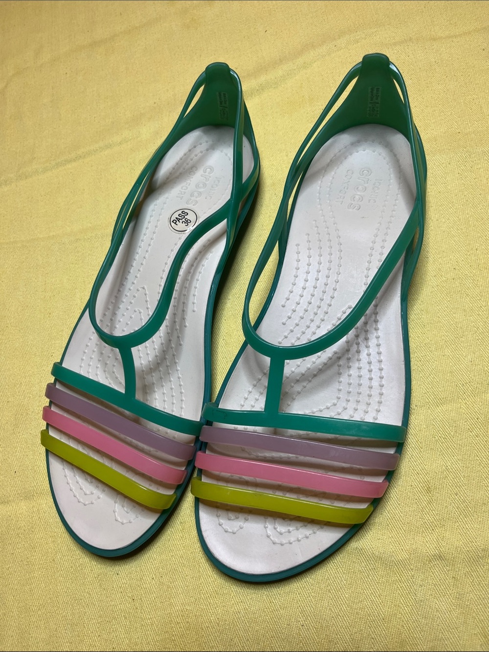 Crocs Womenโs Green Jelly T-Strap Sandals with Pink & Yellow Straps